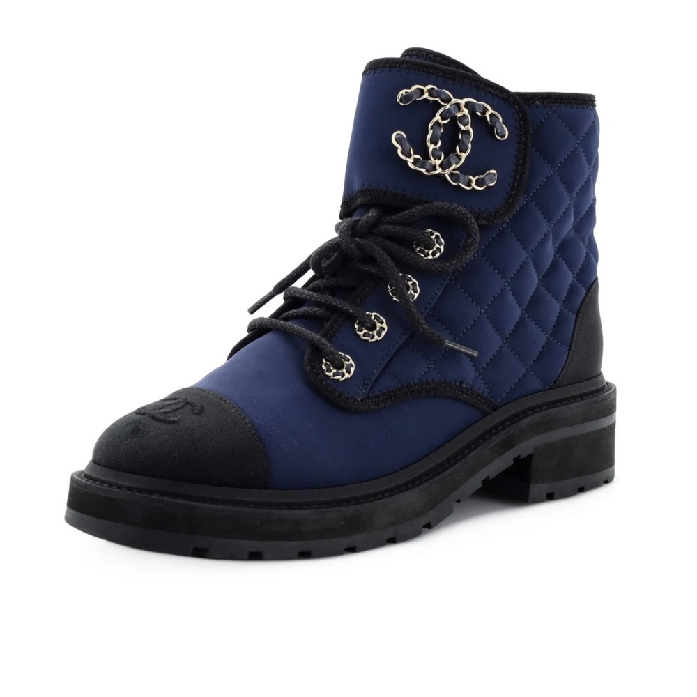 Step into fierce and fashionable style with these like CHANEL Brave Blue boot